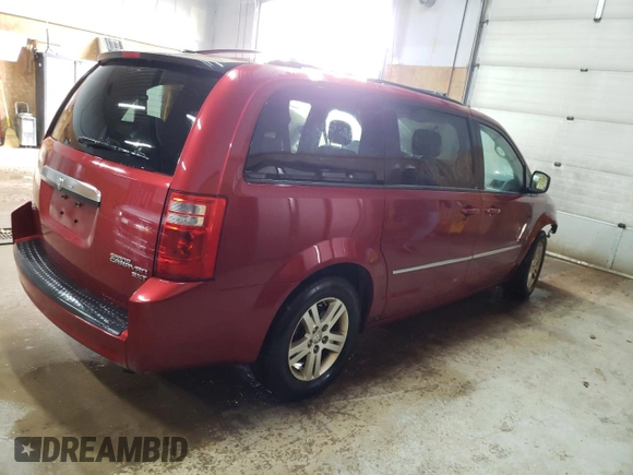 2010 Dodge Grand Caravan Crew with VIN 2D4RN6DX8AR419274, listed as a Copart auction lot 54915055 with 304,675 mi miles and Clean Title. Bid and sale history available at DreamBid. Image 3.