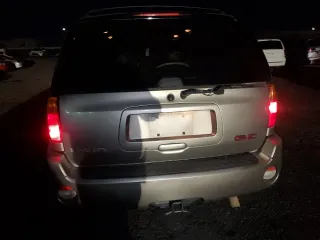 2002 GMC Envoy SLT with VIN 1GKDT13S522286497, listed as a Copart auction lot 84501384 with 207,226 mi miles and Salvage Title. Bid and sale history available at carsss.com. Image 6.