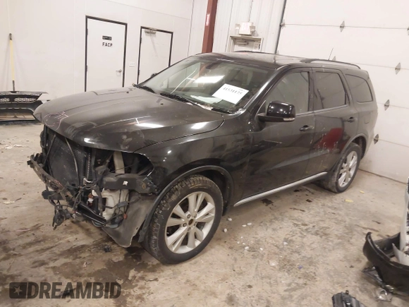 2012 Dodge Durango Crew with VIN 1C4SDJDT6CC205946, listed as a IAAI auction lot 41531175 with 211,372 mi miles and . Bid and sale history available at carsss.com. Image 2.