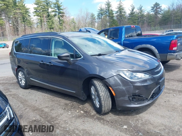 2017 Chrysler Pacifica Touring L with VIN 2C4RC1BGXHR667397, listed as a IAAI auction lot 42085117 with 63,996 mi miles and . Bid and sale history available at DreamBid. Image 13.