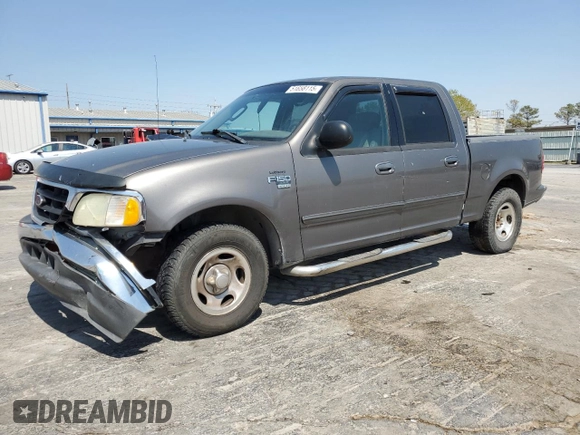 2003 Ford F-150 XLT with VIN 1FTRW07663KA63497, listed as a Copart auction lot 51658115 with 269,633 mi miles and Salvage Title. Bid and sale history available at carsss.com. Image 1.