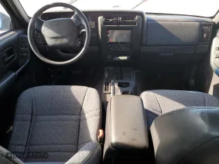 2000 Jeep Cherokee Police with VIN 1J4FF48S1YL246243, listed as a Copart auction lot 84954674 with 0 mi miles and Salvage Title. Bid and sale history available at carsss.com. Image 8.