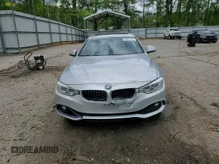 2016 BMW 4 Series 428i xDrive z VIN WBA4C9C52GG136035, wystawiony jako Copart lot #52501455 z przebiegiem 181 086 mil mil oraz Szkoda całkowita • Salvage title. Historia ofert i sprzedaży dostępna na DreamBid. Obrazek 13.