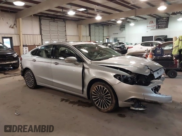 2017 Ford Fusion SE z VIN 3FA6P0H95HR203170, wystawiony jako IAAI lot #41569303 z przebiegiem 143 287 mil mil oraz . Historia ofert i sprzedaży dostępna na DreamBid. Obrazek 1.
