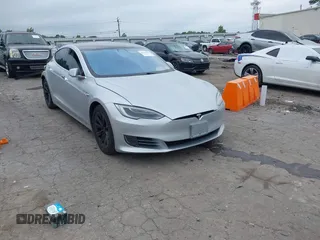 2017 Tesla Model S 100D with VIN 5YJSA1E28HF199687, listed as a IAAI auction lot 42353657 with 68,533 mi miles and . Bid and sale history available at DreamBid. Image 1.