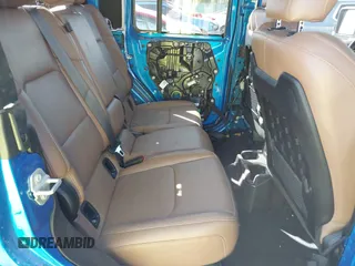 2023 Jeep Gladiator Rubicon with VIN 1C6JJTBG3PL581023, listed as a IAAI auction lot 41963931 with 15,023 mi miles and . Bid and sale history available at DreamBid. Image 8.