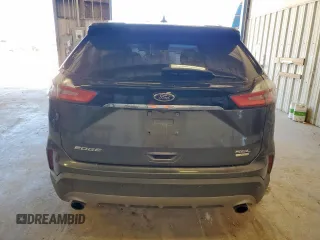 2019 Ford Edge SEL z VIN 2FMPK3J96KBC72783, wystawiony jako Copart lot #57761175 z przebiegiem 153 590 mil mil oraz Czysty tytuł • Clean title. Historia ofert i sprzedaży dostępna na DreamBid. Obrazek 6.