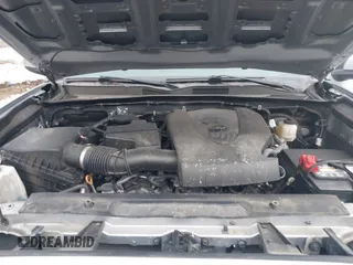 2021 Toyota Tacoma SR z VIN 3TMCZ5AN0MM386867, wystawiony jako IAAI lot #41580426 z przebiegiem 46 559 mil mil oraz . Historia ofert i sprzedaży dostępna na DreamBid. Obrazek 10.