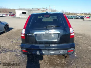2009 Honda CR-V EX-L with VIN JHLRE48719C022962, listed as a IAAI auction lot 41819577 with 173,266 mi miles. Bid and sale history available at carsss.com. Image 16.
