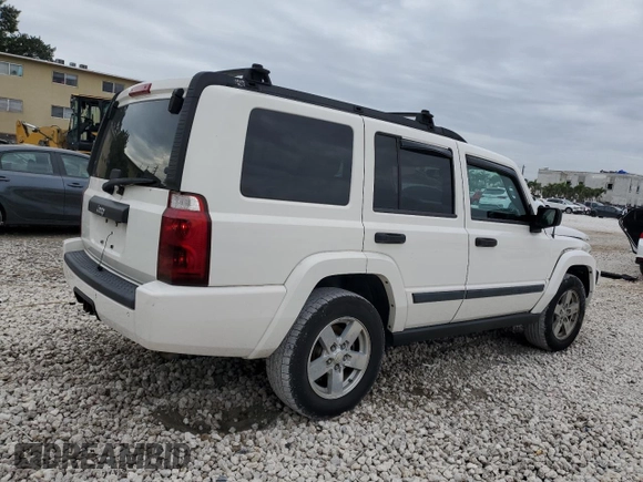 2006 Jeep Commander with VIN 1J8HH48N06C352871, listed as a Copart auction lot 87740115 with 163,703 mi miles and Salvage Title. Bid and sale history available at carsss.com. Image 3.