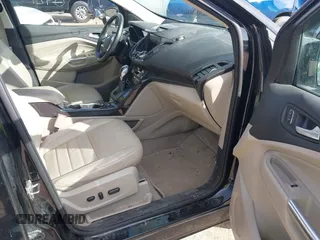 2016 Ford Escape Titanium with VIN 1FMCU9JX4GUB38303, listed as a IAAI auction lot 41788421 with 138,511 mi miles and . Bid and sale history available at DreamBid. Image 5.