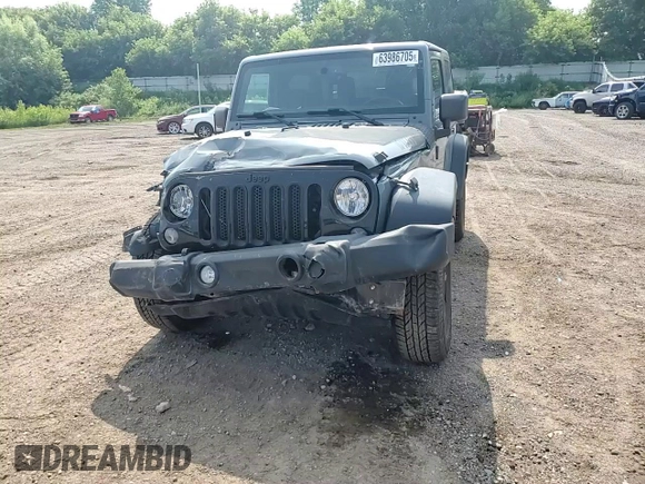 2015 Jeep Wrangler Willys Wheeler z VIN 1C4AJWAG2FL647913, wystawiony jako Copart lot #63986705 z przebiegiem 111 426 mil mil oraz Czysty tytuł • Clean title. Historia ofert i sprzedaży dostępna na DreamBid. Obrazek 15.