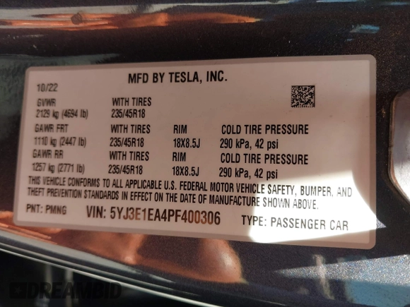2023 Tesla Model 3 with VIN 5YJ3E1EA4PF400306, listed as a IAAI auction lot 42398603 with 18,551 mi miles and . Bid and sale history available at DreamBid. Image 9.
