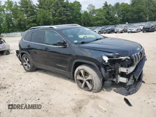 2019 Jeep Cherokee High Altitude with VIN 1C4PJMDX2KD283992, listed as a Copart auction lot 59849195 with 103,463 mi miles and Salvage title. Bid and sale history available at DreamBid. Image 4.