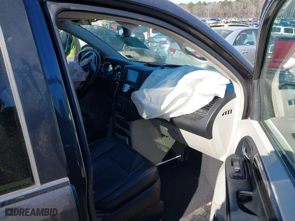 2016 Chrysler Town & Country Touring with VIN 2C4RC1BG4GR297286, listed as a IAAI auction lot 41333098 with 216,500 mi miles. Bid and sale history available at carsss.com. Image 5.