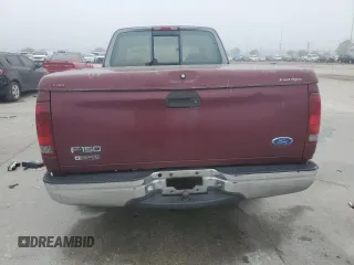 1997 Ford F-150 with VIN 2FTDX1726VCA74811, listed as a Copart auction lot 81909844 with 136,520 mi miles and Salvage title. Bid and sale history available at DreamBid. Image 6.