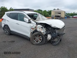 2014 Hyundai Santa Fe with VIN 5XYZUDLB2EG169678, listed as a IAAI auction lot 23030707 with 73,347 mi miles and . Bid and sale history available at DreamBid. Image 1.