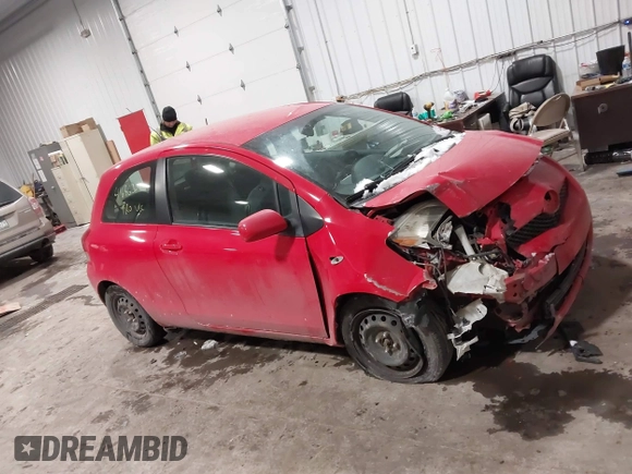 2009 Toyota Yaris with VIN JTDJT903695262292, listed as a IAAI auction lot 41636204 with 157,986 mi miles. Bid and sale history available at carsss.com. Image 13.