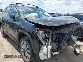 2022 Toyota RAV4 XLE Premium with VIN 2T3C1RFV1NC205266, listed as a IAAI auction lot 42228495 with 31,592 mi miles and . Bid and sale history available at DreamBid. Image 1.