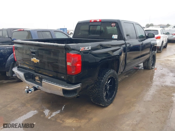 2015 Chevrolet Silverado 1500 LT with VIN 3GCUKREH8FG239959, listed as a IAAI auction lot 41483334 with 180,739 mi miles. Bid and sale history available at carsss.com. Image 4.