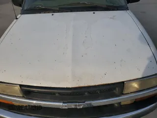 1999 Chevrolet Blazer LT с VIN 1GNDT13W1X2163194, выставлен на аукционе Copart как лот 82897414 с пробегом Не указан миль и Списание • Salvage title. История ставок и продаж доступна на DreamBid. Изображение 12.