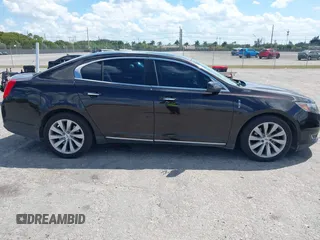 2014 Lincoln MKS with VIN 1LNHL9EK0EG608300, listed as a IAAI auction lot 41900902 with 144,253 mi miles. Bid and sale history available at carsss.com. Image 13.