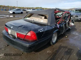 2000 Mercury Grand Marquis LS с VIN 2MEFM75W5YX704016, выставлен на аукционе Copart как лот 66122071 с пробегом Не указан миль и Списание • Salvage title. История ставок и продаж доступна на DreamBid. Изображение 4.