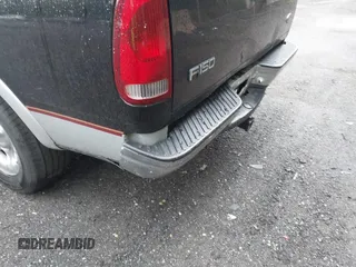 2000 Ford F-150 XL z VIN 1FTRX17L2YNB60131, wystawiony jako IAAI lot #42295537 z przebiegiem 216 638 mil mil oraz . Historia ofert i sprzedaży dostępna na DreamBid. Obrazek 6.