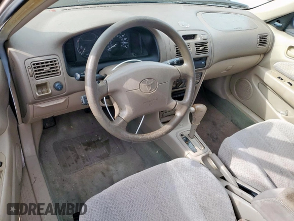 1999 Toyota Corolla VE z VIN 1NXBR12E0XZ215258, wystawiony jako Copart lot #60704095 z przebiegiem Nie podano mil oraz Szkoda całkowita • Salvage title. Historia ofert i sprzedaży dostępna na DreamBid. Obrazek 8.