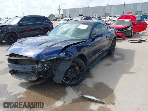 2018 Ford Mustang EcoBoost z VIN 1FA6P8TH0J5104312, wystawiony jako IAAI lot #42532806 z przebiegiem 87 564 mil mil oraz . Historia ofert i sprzedaży dostępna na DreamBid. Obrazek 18.