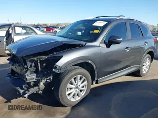 2016 Mazda CX-5 Touring with VIN JM3KE2CY4G0695947, listed as a IAAI auction lot 41824490 with 162,191 mi miles and . Bid and sale history available at carsss.com. Image 18.
