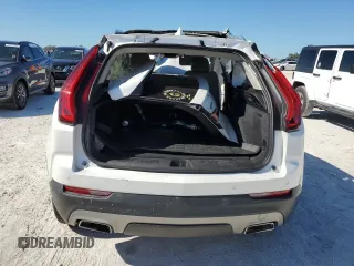 2020 Cadillac XT4 FWD Premium Luxury with VIN 1GYFZCR48LF128683, listed as a Copart auction lot 49591405 with 0 mi miles and Salvage Title. Bid and sale history available at carsss.com. Image 6.