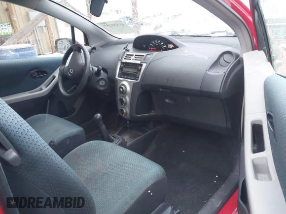 2008 Toyota Yaris with VIN JTDJT923285159575, listed as a IAAI auction lot 41559257 with 206,466 mi miles. Bid and sale history available at carsss.com. Image 5.