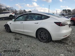 2022 Tesla Model 3 Long Range with VIN 5YJ3E1EB2NF361821, listed as a Copart auction lot 85108664 with 25,021 mi miles and Salvage Title. Bid and sale history available at DreamBid. Image 2.