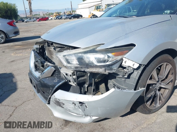 2017 Nissan Maxima Platinum with VIN 1N4AA6AP2HC414204, listed as a IAAI auction lot 42394624 with 80,486 mi miles and . Bid and sale history available at DreamBid. Image 6.