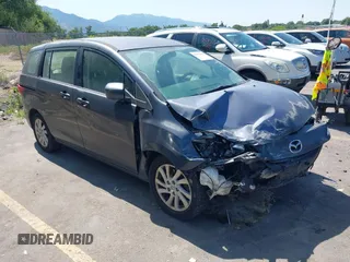 2012 Mazda 5 Sport with VIN JM1CW2BL1C0116150, listed as a IAAI auction lot 42571812 with 124,236 mi miles and . Bid and sale history available at DreamBid. Image 1.