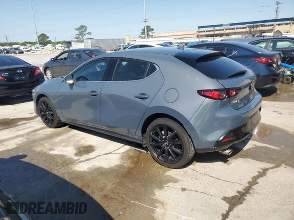 2021 Mazda 3 Premium with VIN JM1BPAML4M1401436, listed as a Copart auction lot 52317505 with 72,680 mi miles and Salvage Title. Bid and sale history available at DreamBid. Image 2.