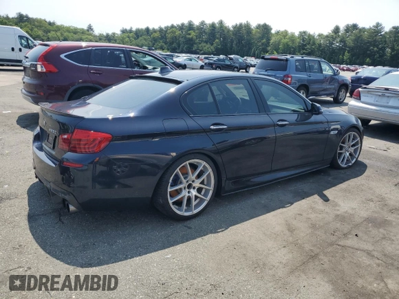 2016 BMW 5 Series 550i xDrive with VIN WBAKP9C52GG587591, listed as a Copart auction lot 58402505 with 94,384 mi miles and Salvage title. Bid and sale history available at DreamBid. Image 3.