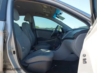 2015 Hyundai Accent GLS with VIN KMHCT4AE5FU808332, listed as a IAAI auction lot 42033625 with 195,433 mi miles. Bid and sale history available at carsss.com. Image 5.