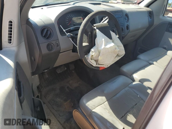2006 Ford F-150 XL with VIN 1FTRF12W06NA22654, listed as a Copart auction lot 57064735 with 228,697 mi miles and Salvage title. Bid and sale history available at DreamBid. Image 8.