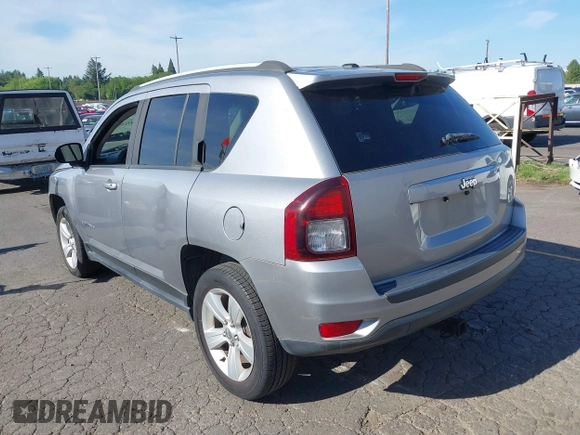 2016 Jeep Compass Sport with VIN 1C4NJCBA5GD574185, listed as a IAAI auction lot 42234955 with 127,468 mi miles and . Bid and sale history available at DreamBid. Image 3.
