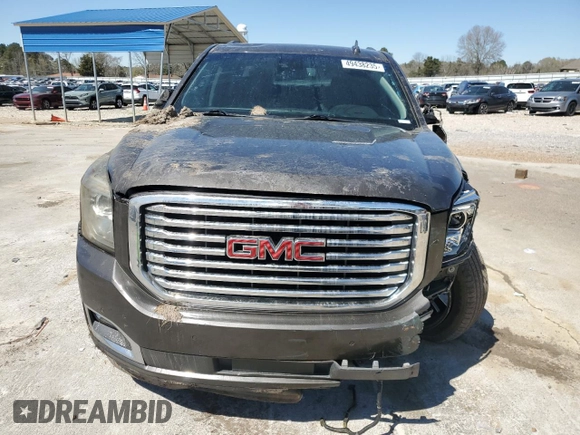 2019 GMC Yukon SLT with VIN 1GKS1BKC1KR117730, listed as a Copart auction lot 49438235 with 147,347 mi miles and Salvage Title. Bid and sale history available at carsss.com. Image 5.