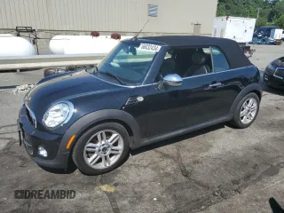 2013 MINI Convertible with VIN WMWZN3C54DT568237, listed as a Copart auction lot 72354594 with 141,058 mi miles and Salvage Title. Bid and sale history available at DreamBid. Image 1.