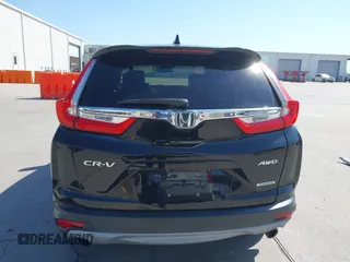 2018 Honda CR-V Touring with VIN 2HKRW2H91JH630702, listed as a IAAI auction lot 41983516 with 84,355 mi miles. Bid and sale history available at carsss.com. Image 16.