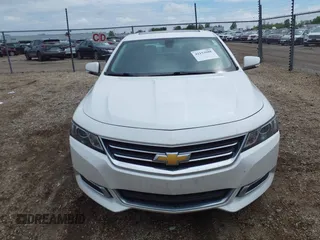 2015 Chevrolet Impala LT with VIN 1G1125S30FU140935, listed as a IAAI auction lot 42153988 with 147,828 mi miles and . Bid and sale history available at DreamBid. Image 12.