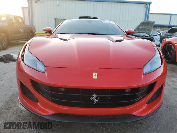2019 Ferrari Portofino z VIN ZFF89FPA0K0242592, wystawiony jako Copart lot #74249014 z przebiegiem Nie podano mil oraz Nie do naprawy. Historia ofert i sprzedaży dostępna na DreamBid. Obrazek 5.