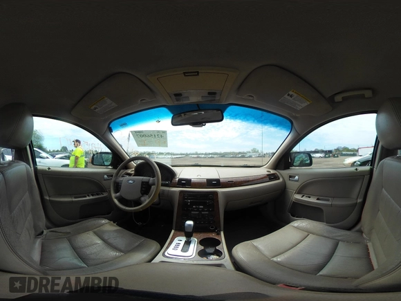 2006 Ford Five Hundred SEL with VIN 1FAFP24186G186073, listed as a IAAI auction lot 42156007 with 283,655 mi miles. Bid and sale history available at carsss.com. Image 18.