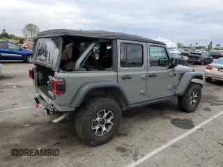 2022 Jeep Wrangler Unlimited Rubicon with VIN 1C4HJXFGXNW158038, listed as a Copart auction lot 53020575 with 14,355 mi miles and Salvage title. Bid and sale history available at DreamBid. Image 3.