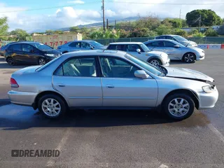 2002 Honda Accord SE with VIN 1HGCG56712A064900, listed as a IAAI auction lot 42184540 with Not provided miles and . Bid and sale history available at DreamBid. Image 13.