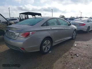 2013 Hyundai Sonata Hybrid with VIN KMHEC4A41DA092477, listed as a IAAI auction lot 41453656 with 124,804 mi miles. Bid and sale history available at carsss.com. Image 4.